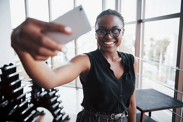 american-business-woman-speaks-her-cellphone-office